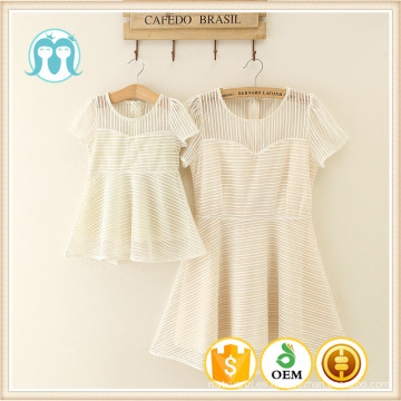 2016 Nueva Moda Cremosa Casual Verano Mujer Vestido niños Guangzhou fábrica de ropa para adultos y niños con precio barato